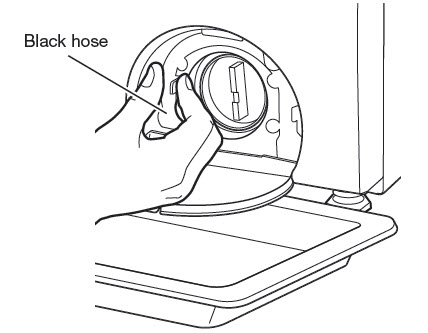 Water removal from drain pump filter with black hose